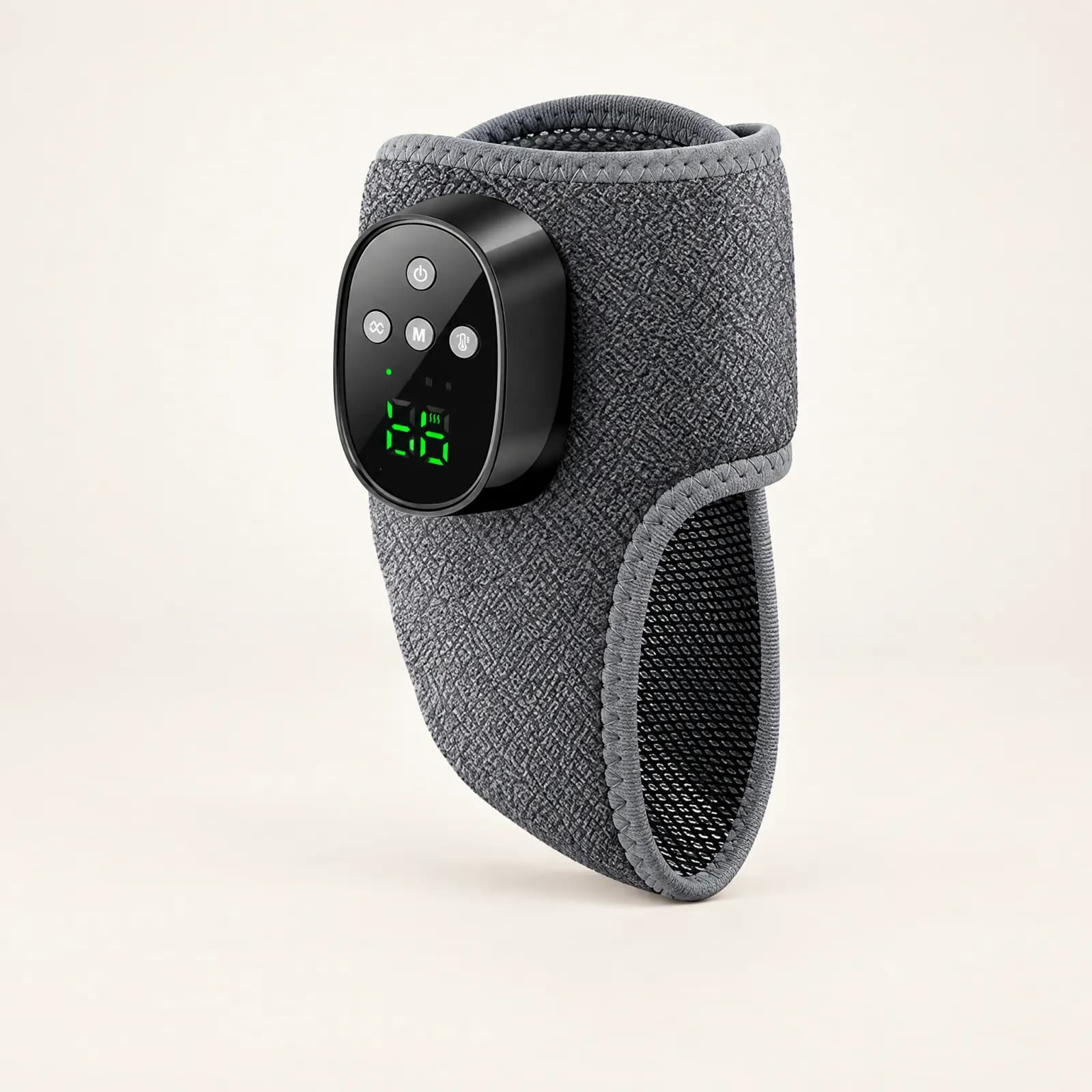 Ardora Foot & Ankle heated wrap, grey fabric with a black controller, on a warm off-white surface